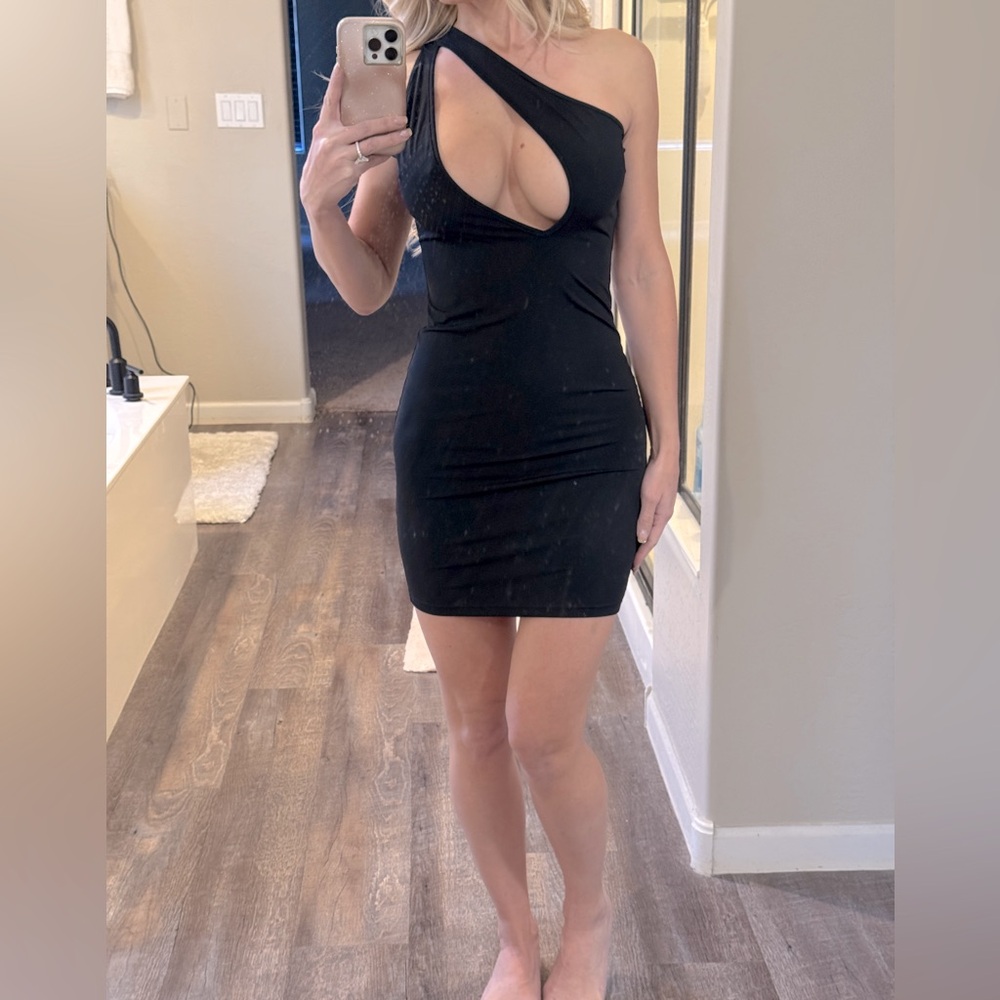 Open front angled little black mini dress.  Size XS.